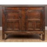 An 18th century and later oak panelled Welsh housekeeper's cupboard