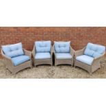 A set of four Lloyd Loom style wicker armchairs