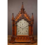 A substantial 19th century oak Gothic style bracket clock by Elkington & Co