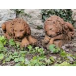 A pair of cast terracotta recumbent lions after Canova