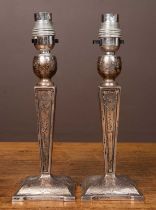 A pair of white metal table lamps