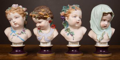 A set of four mid-19th century Continental porcelain busts of children