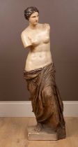 An antique painted plaster sculpture depicting The Venus de Milo