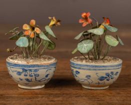 Beatrice Elizabeth Hindley (1882-1973), a pair of miniature model plant pots with nasturtiums