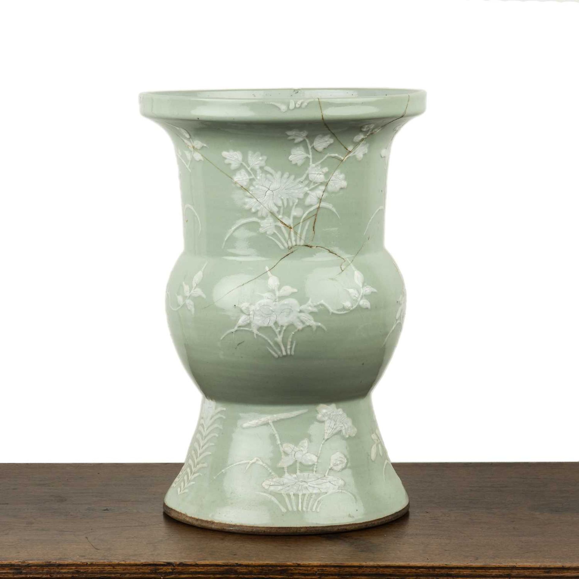 Celadon and white opaque beaker vase Chinese, 19th Century with raised foliate and bird sprays,