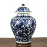 Blue and white porcelain baluster vase and cover Chinese, late 17th/18th Century decorated with