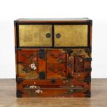 Gilt lacquer and painted cabinet Japanese, late 19th Century with fitted sliding doors and bird,