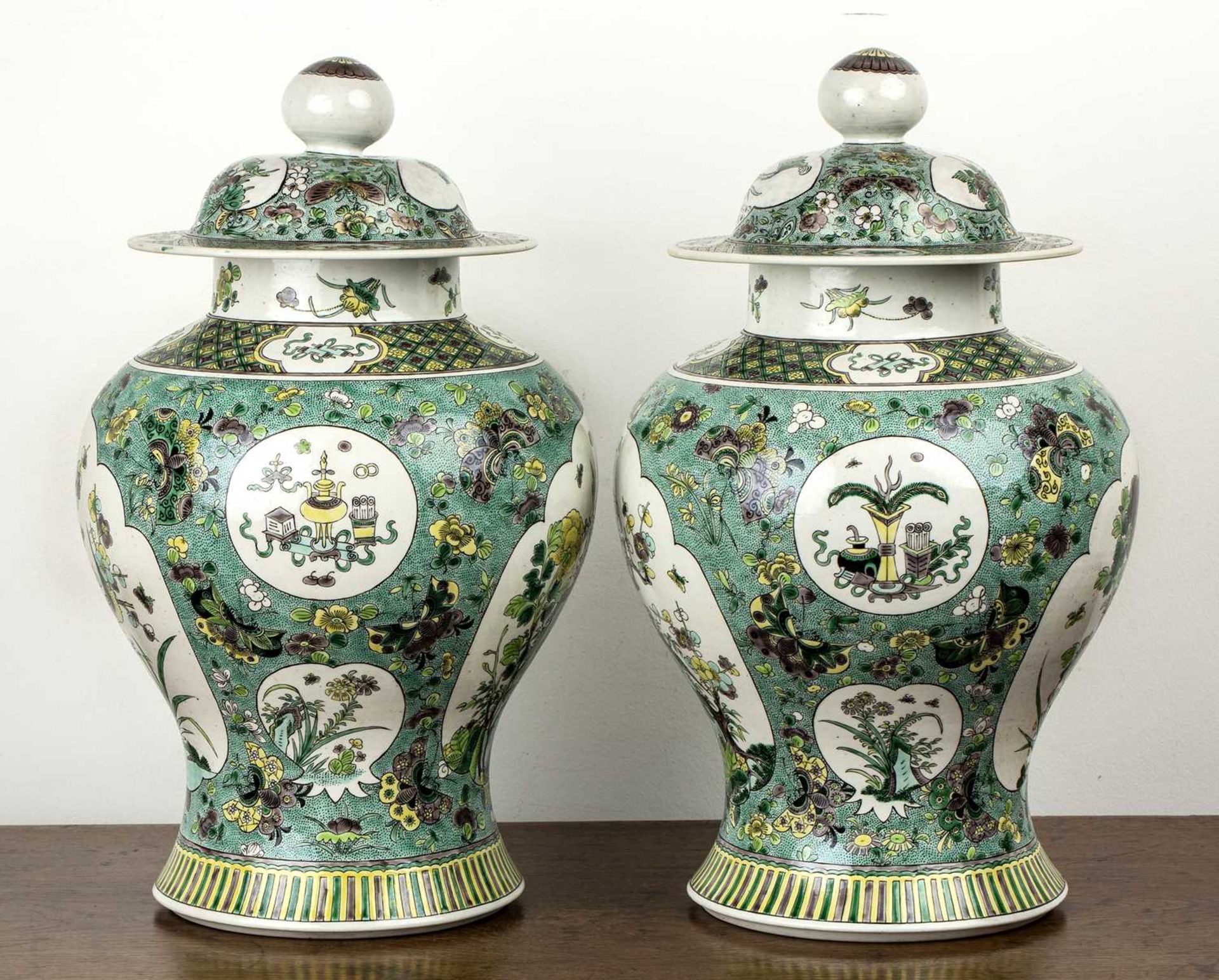 Pair of biscuit baluster vases and covers Chinese, 19th Century each painted in green enamels with - Image 2 of 9