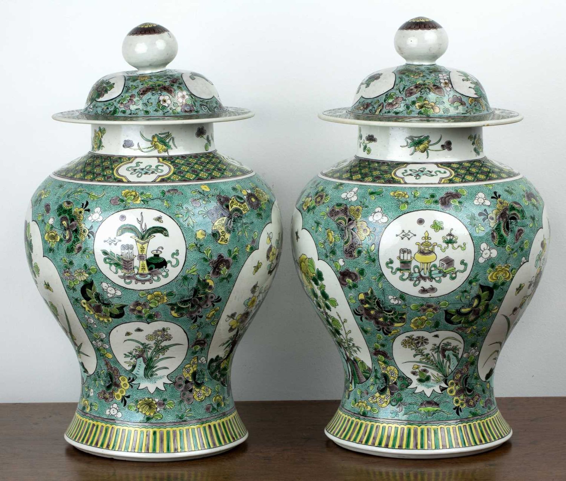 Pair of biscuit baluster vases and covers Chinese, 19th Century each painted in green enamels with - Image 4 of 9