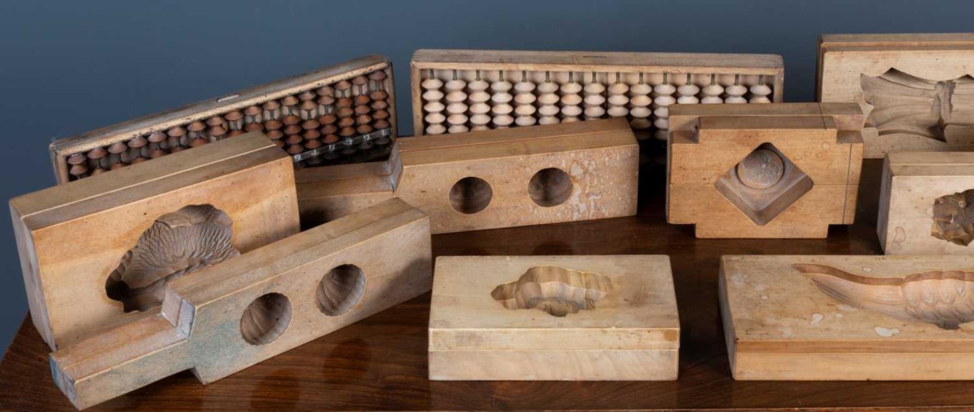 Collection of twelve cherry wood two part cake moulds Japanese, in the form of animals and - Image 2 of 3