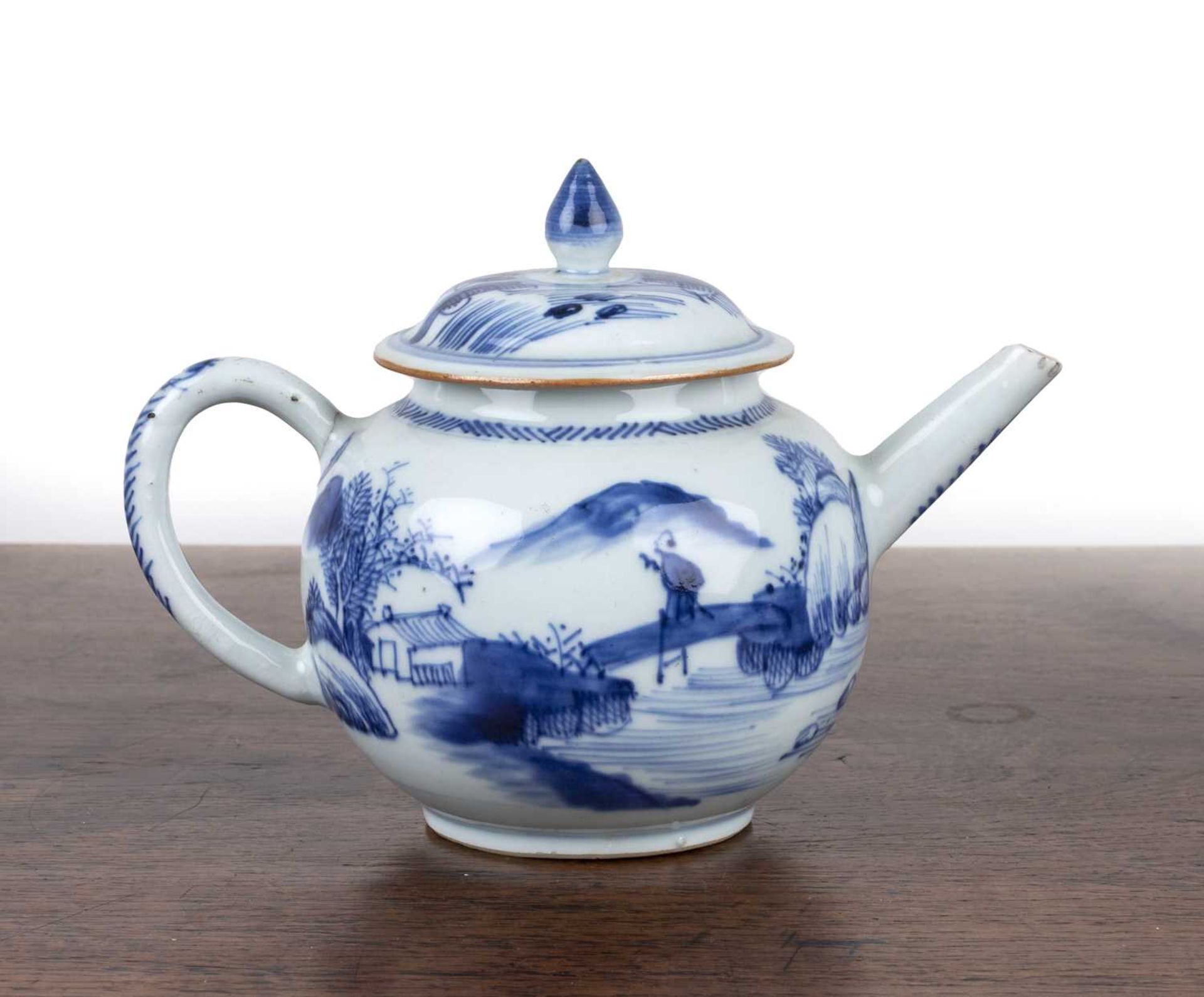 Small blue and white ovoid teapot Chinese, 18th Century painted with a river landscape, 17.5cm