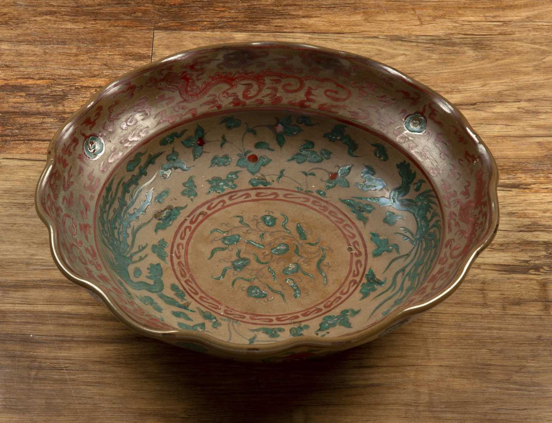 Deep bowl with a wavy rim South East Asian painted with dragons and flaming pearls in green and - Image 2 of 3