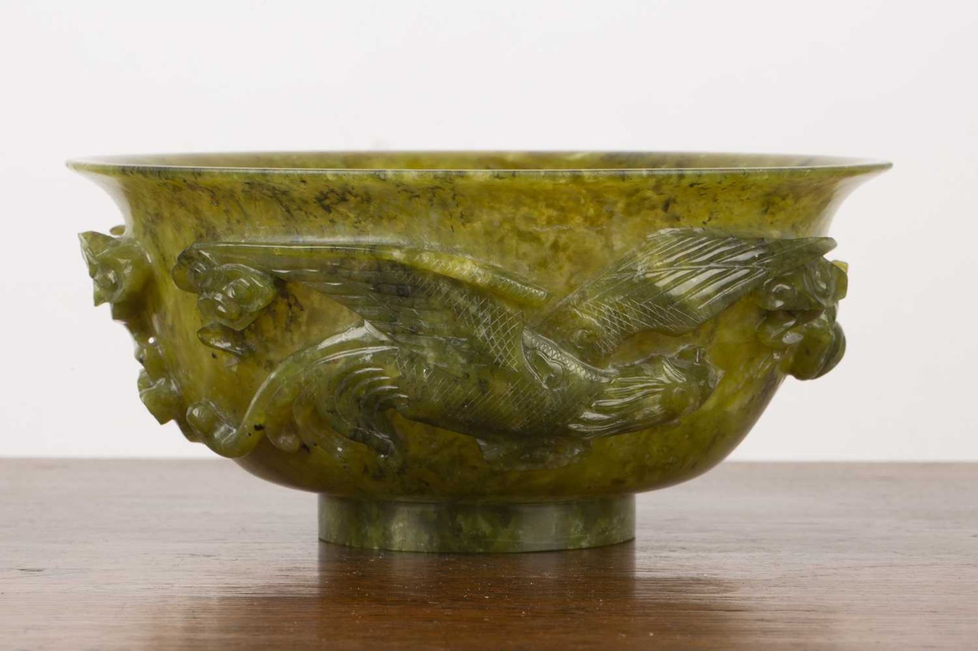 Bowenite bowl Chinese, 20th Century having a carved raised band of a phoenix, dragon, and a - Image 2 of 4