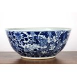 Large blue and white punch bowl Chinese, late18th/19th Century decorated with two dragons in flight,