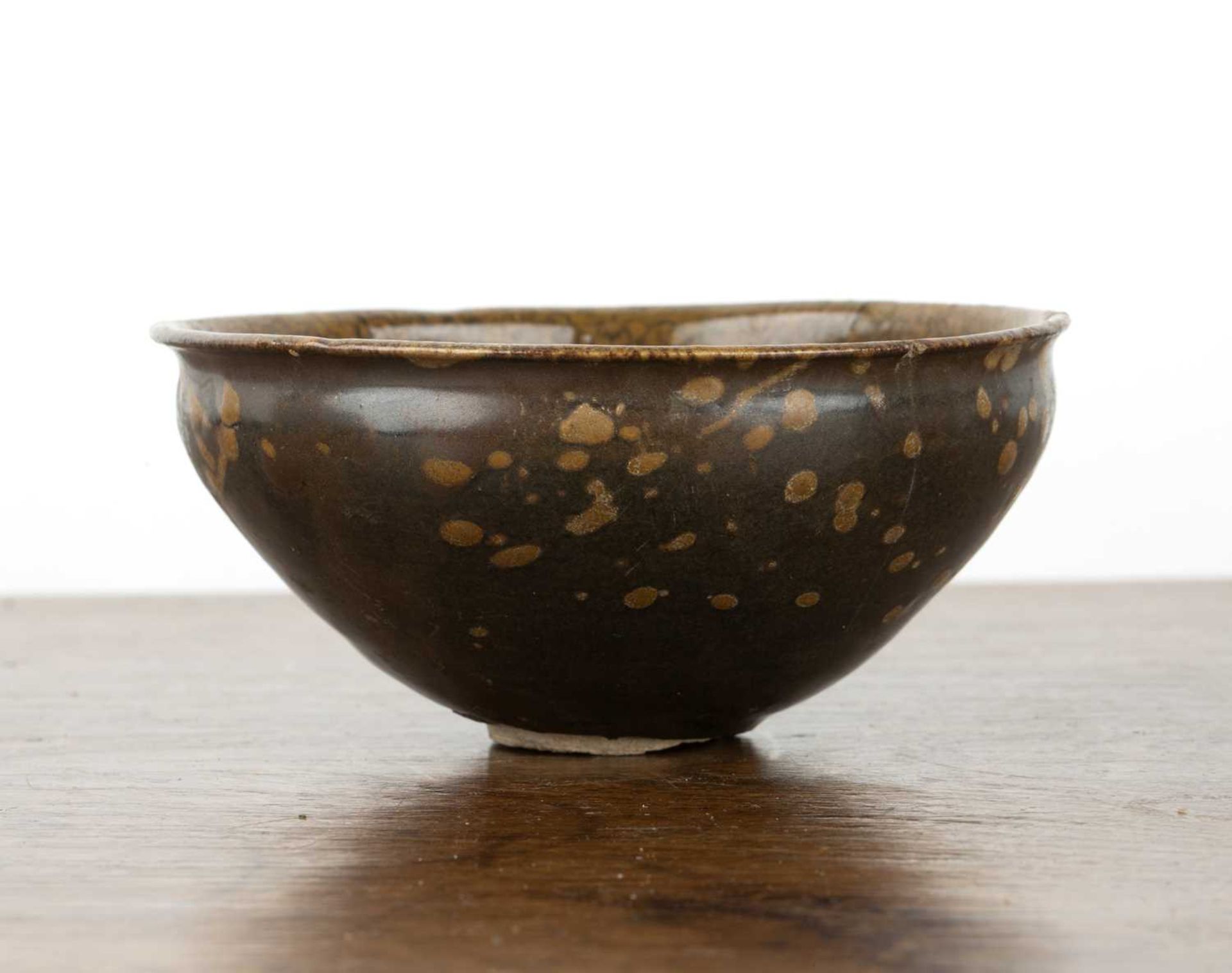 Jizhou tea bowl Southern Song, 12th/13th Century decorated with a wax resist design of a flowering - Image 2 of 4