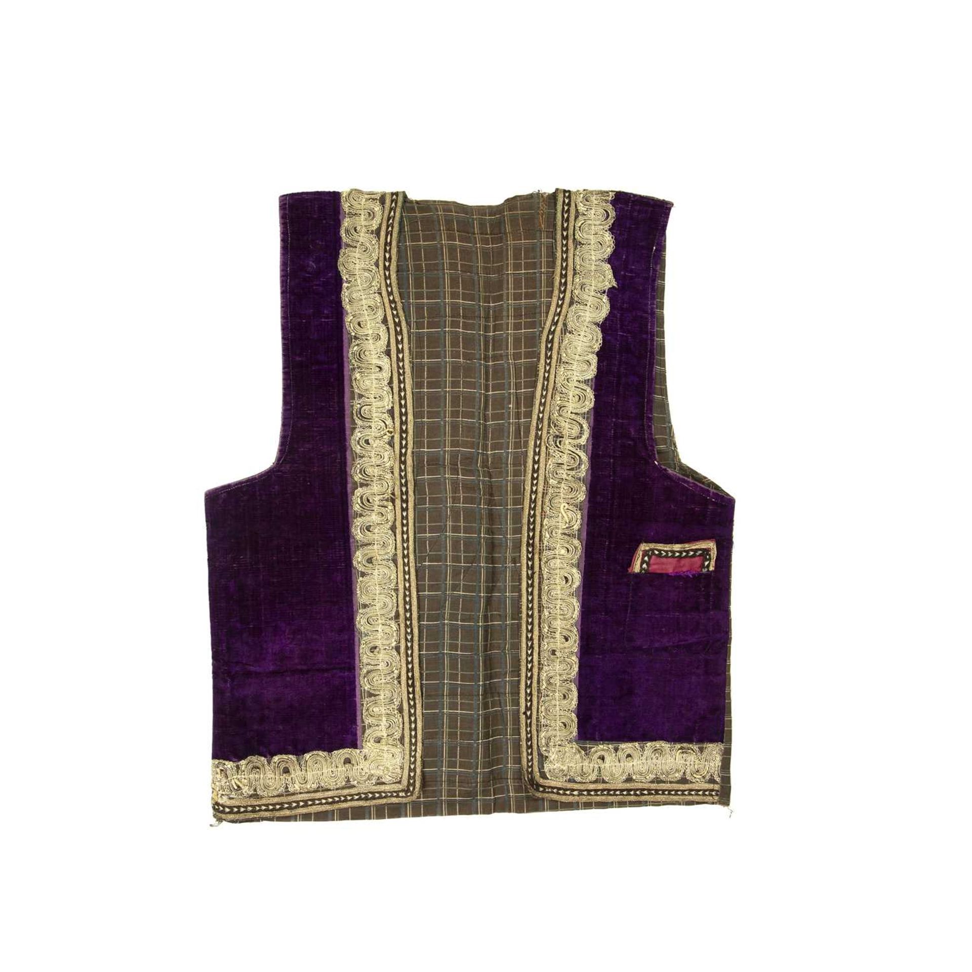 Purple velvet waistcoat Persian or Ottoman with a metal thread border.Overall wear, consistent