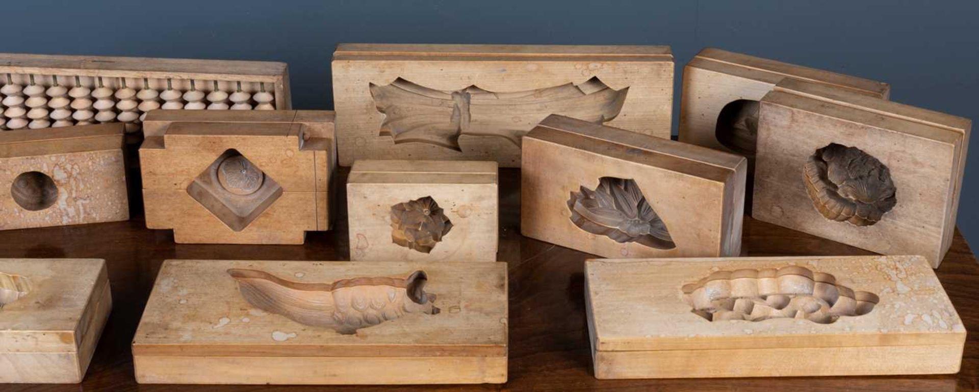 Collection of twelve cherry wood two part cake moulds Japanese, in the form of animals and - Image 3 of 3