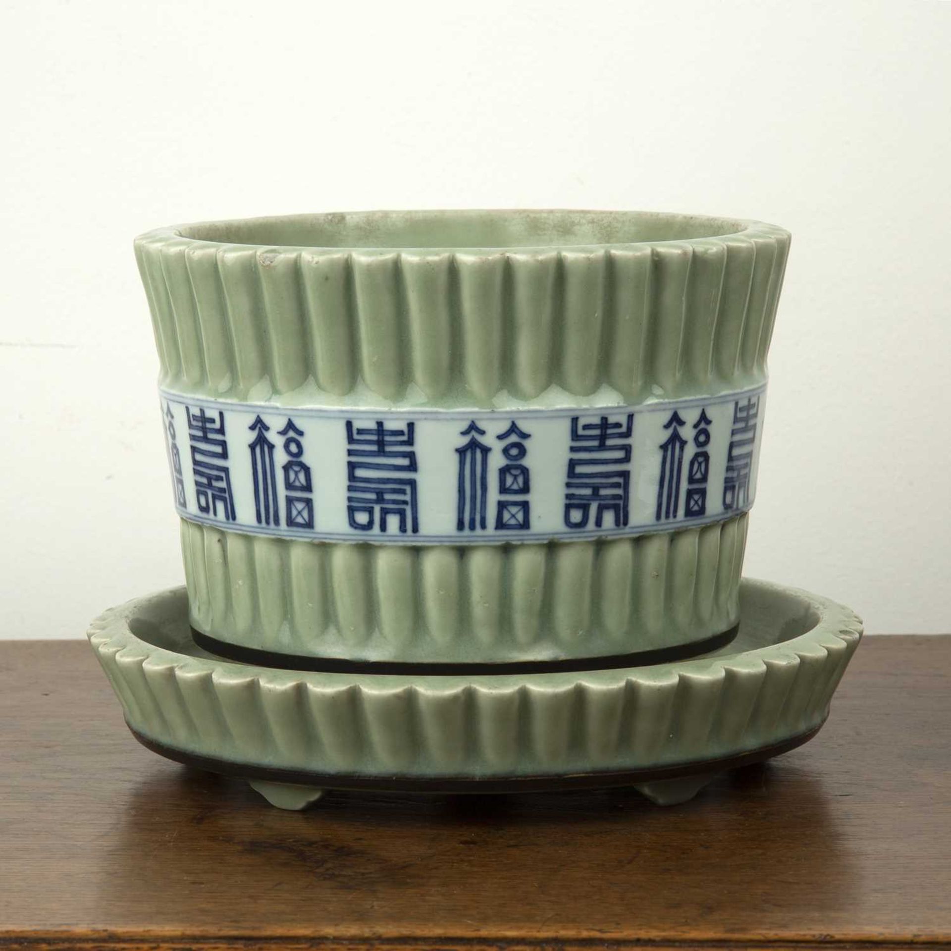 Celadon jardiniere and stand Chinese, 19th Century painted with a band around the centre with blue - Image 2 of 4