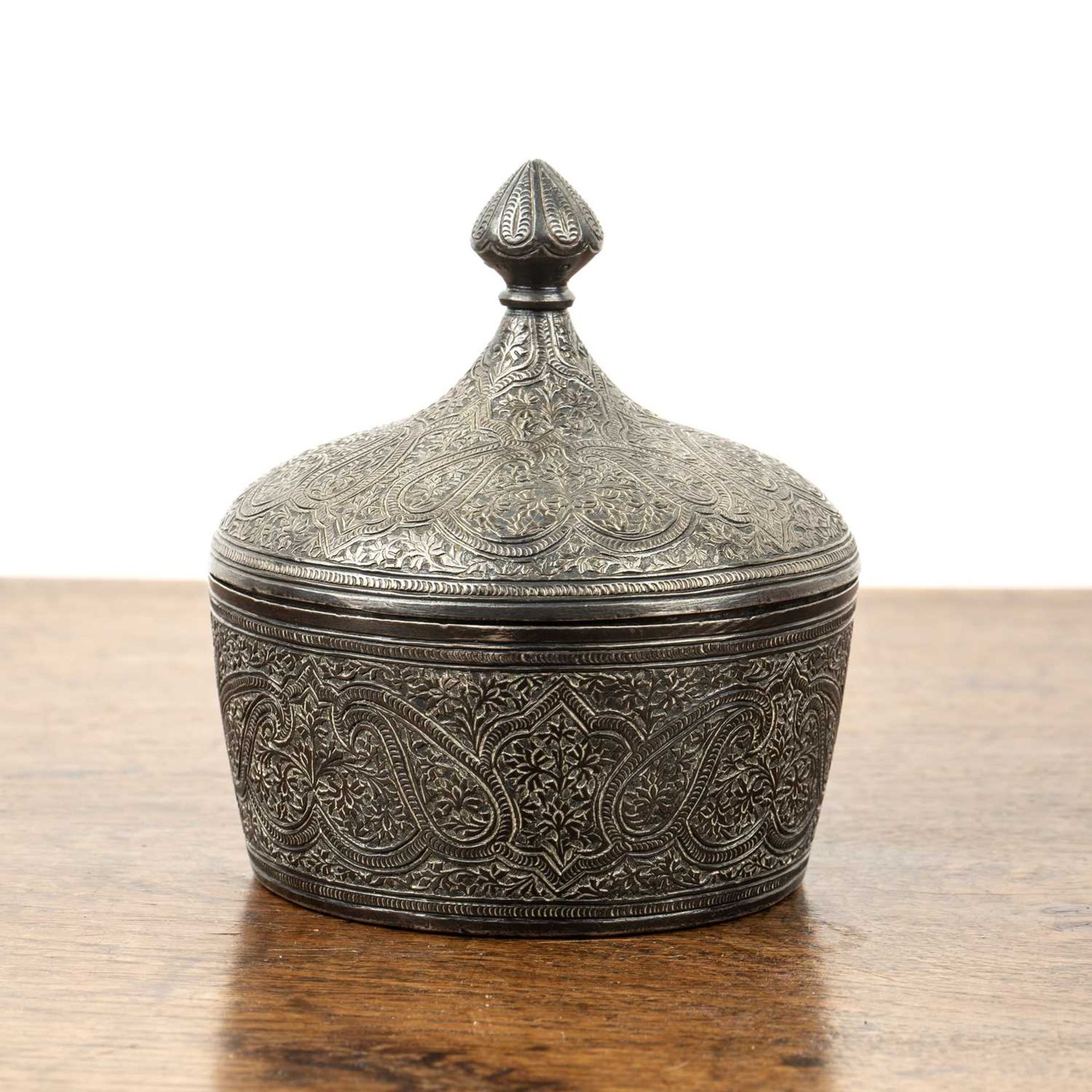 Engraved white metal small powder case and cover Indian with paisley designs, and knopped finial