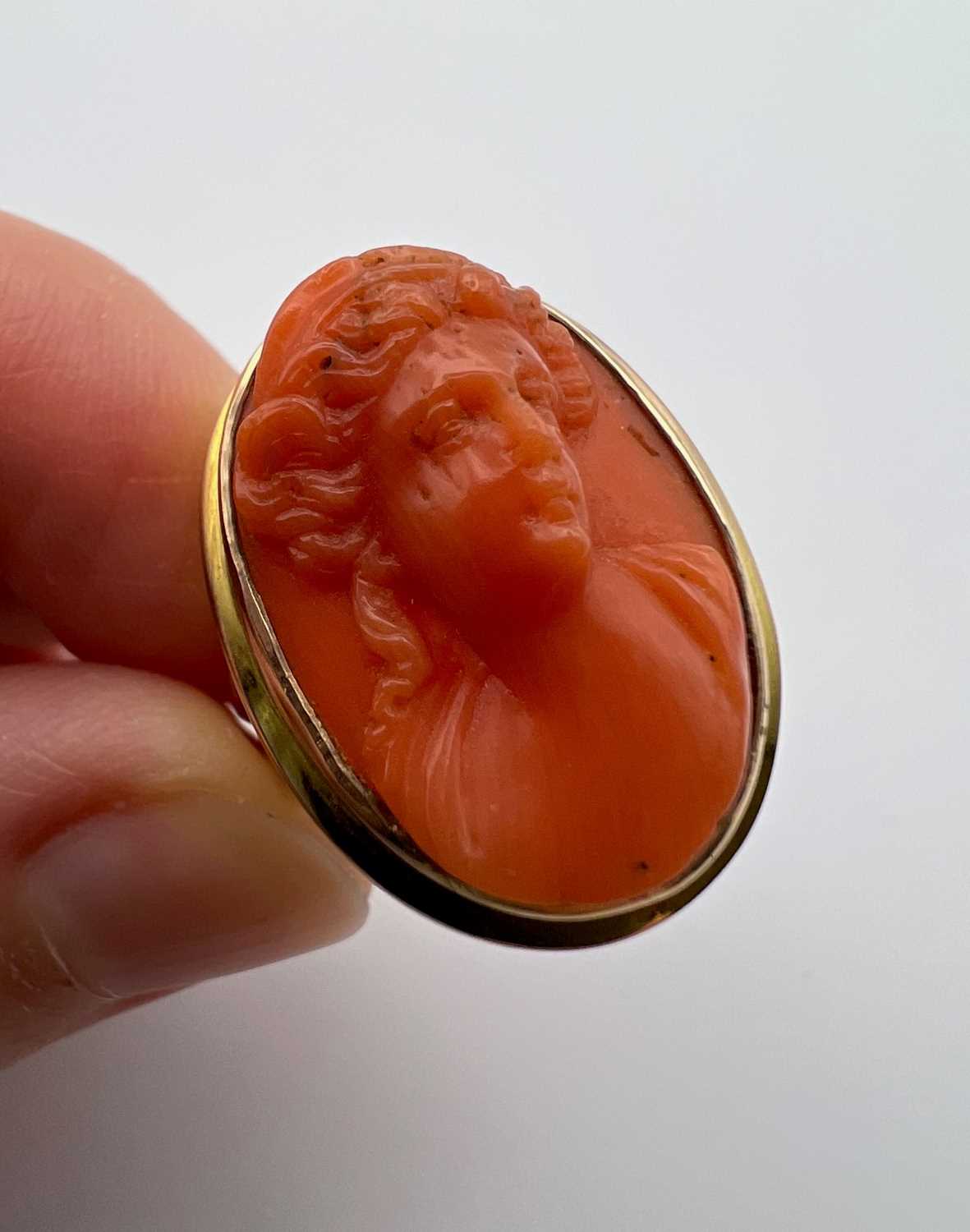 Two coral dress rings, the first a cameo ring, the oval coral corallium rubrum cameo carved to - Image 5 of 14