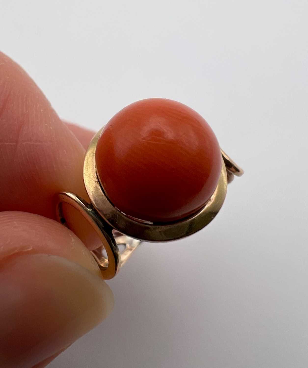 Two coral dress rings, the first a cameo ring, the oval coral corallium rubrum cameo carved to - Image 10 of 14