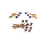 A sapphire brooch and ear studs suite, each modelled as a wirework spray of cabochon sapphires,