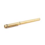 A Must de Cartier gold plated fountain pen, with reeded decoration and sprung clip, no. 329251,