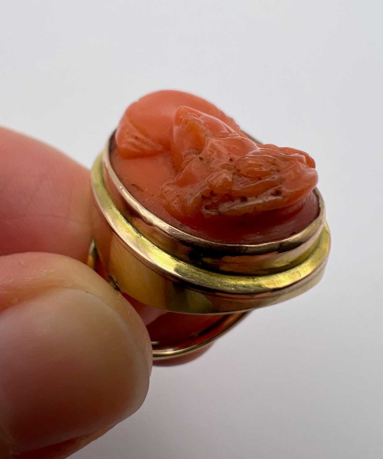 Two coral dress rings, the first a cameo ring, the oval coral corallium rubrum cameo carved to - Image 7 of 14