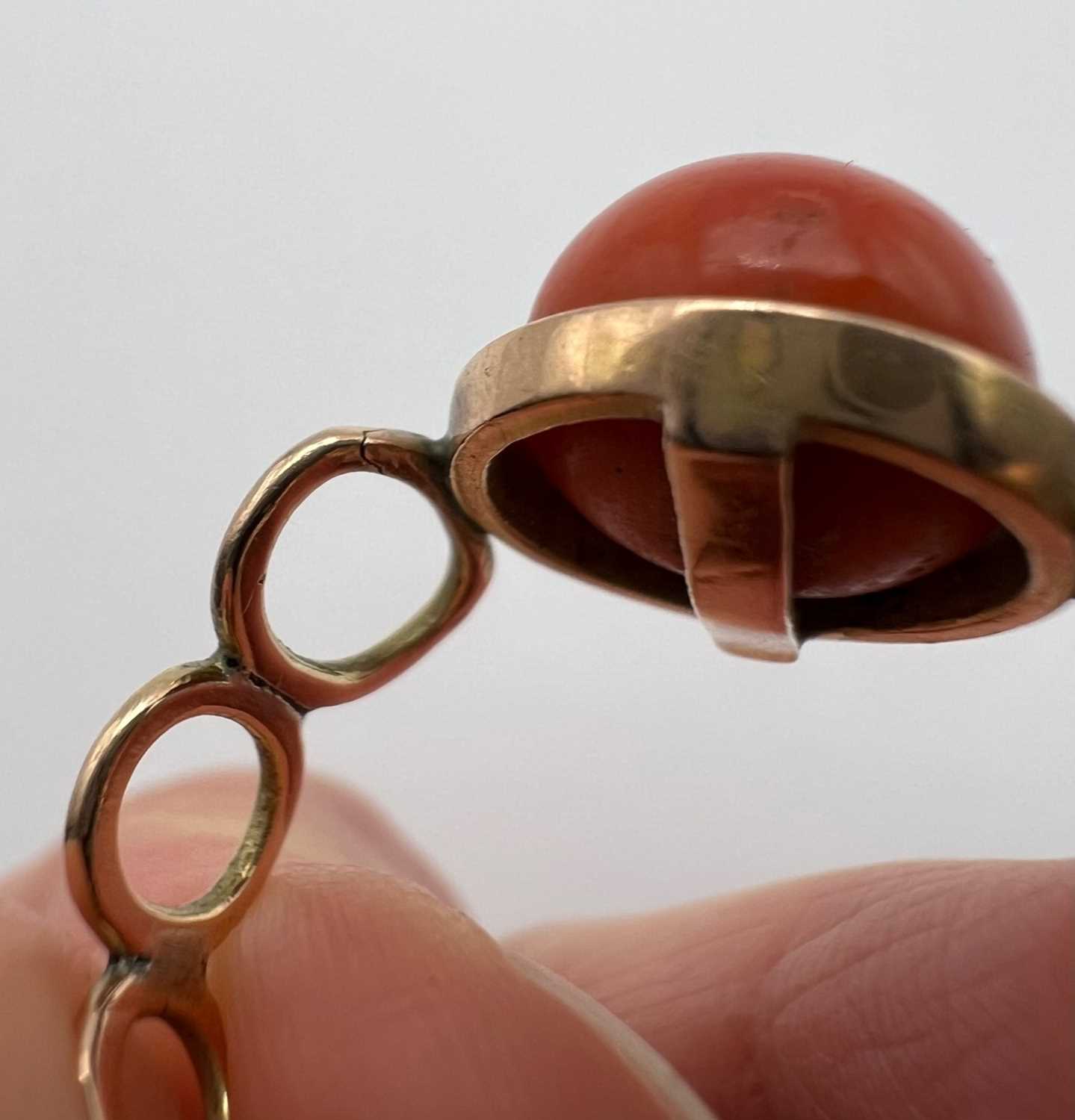 Two coral dress rings, the first a cameo ring, the oval coral corallium rubrum cameo carved to - Image 13 of 14