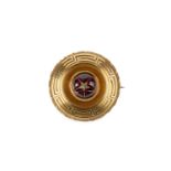 A Victorian garnet and diamond panel brooch, the circular panel with Greek key and ropetwist