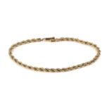 A fancy-link bracelet by Tiffany & Co., of ropetwist design, signed and stamped '14K', length