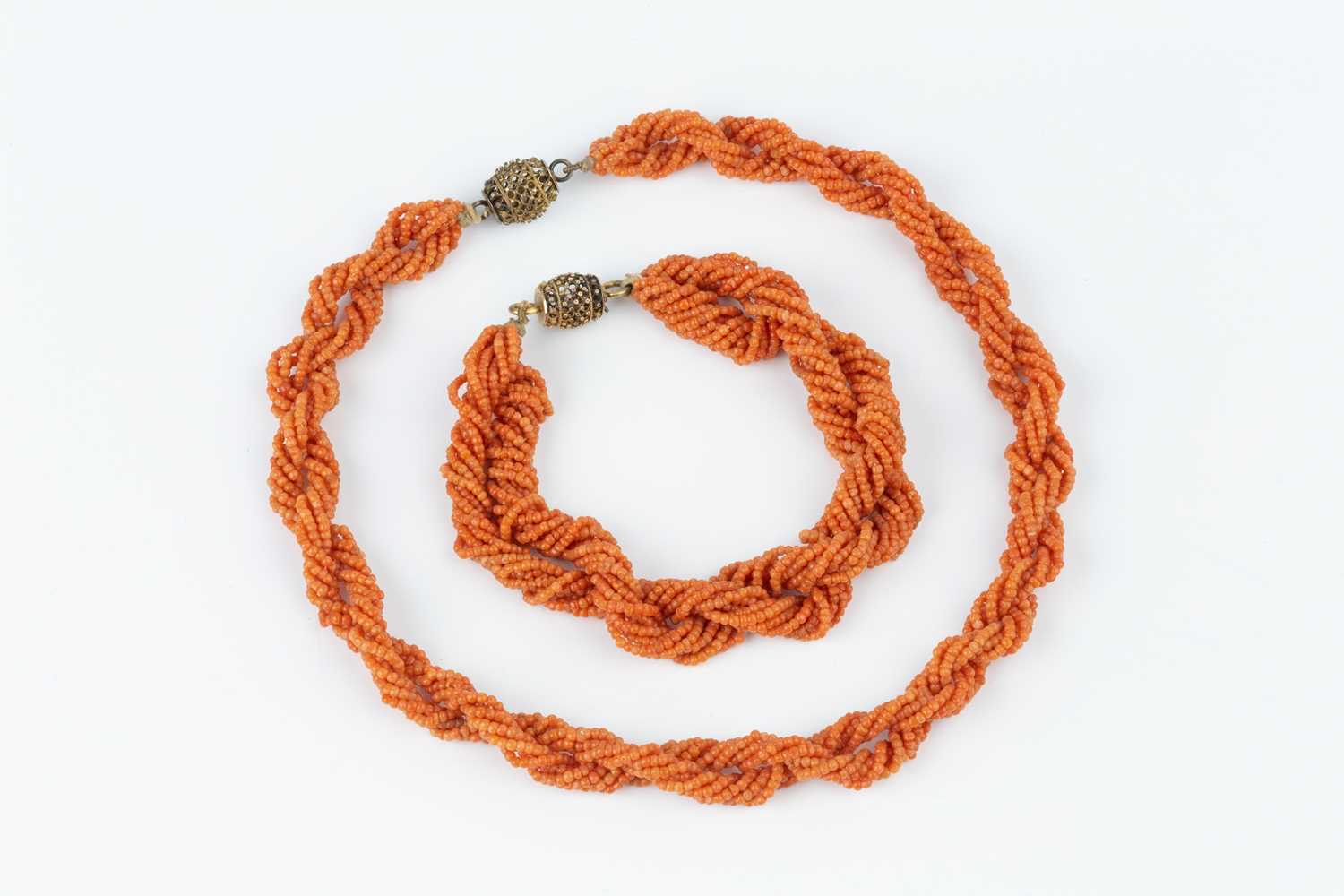 A coral bead torsade necklace and bracelet suite, designed as twisted multi-strands of coral - Image 2 of 7