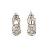 A pair of diamond brooches/pendants, each openwork panel millegrain set with graduated old,