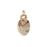 A hardstone pendant by Jack Spencer, inset to both sides with vari-coloured agate panels, the 9ct