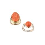 Two coral dress rings, the first a cameo ring, the oval coral corallium rubrum cameo carved to