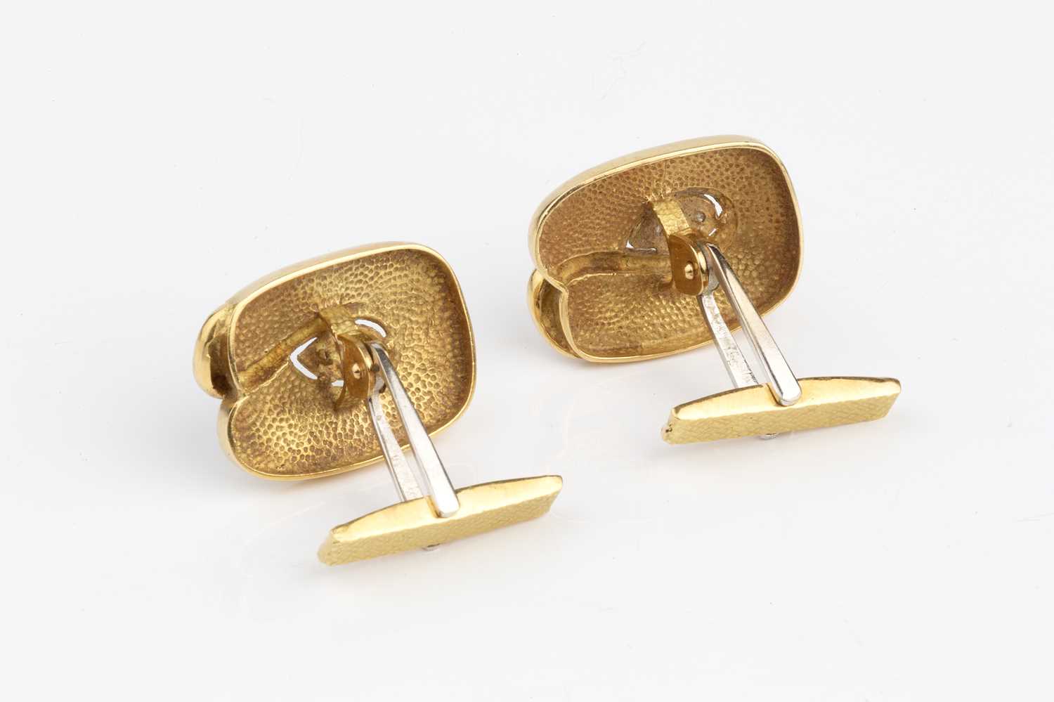 A pair of diamond set cufflinks, each panel designed as an abstract leaf of textured finish, centred - Image 2 of 2