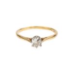 A diamond single stone ring, the cushion-shaped old-cut diamond in claw setting, two colour precious