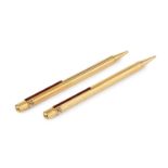 A Must de Cartier gold plated ballpoint pen, with reeded decoration and sprung clip, no. 461953,