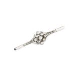 A diamond set bar brooch, designed as a lozenge-shaped openwork cluster of graduated old-cut