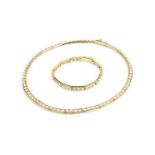 A cultured pearl collar necklace and bracelet suite, each of articulated design, centred with a