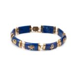 A lapis lazuli panel bracelet, designed as a series of rectangular convex panels, each applied