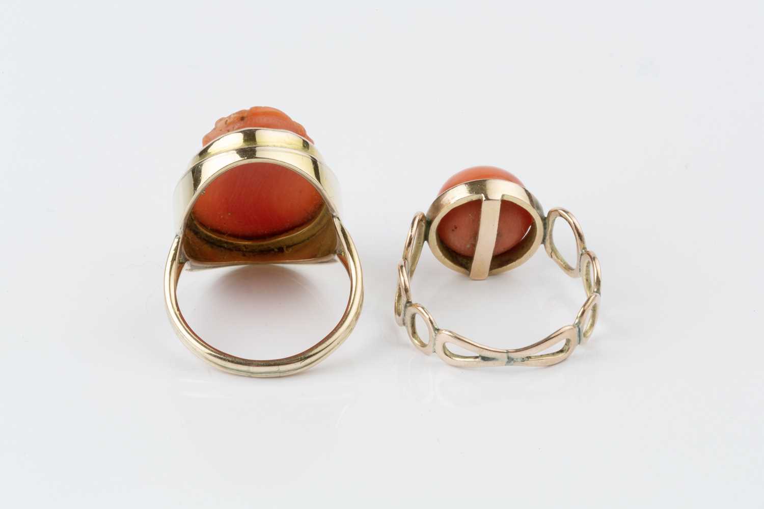 Two coral dress rings, the first a cameo ring, the oval coral corallium rubrum cameo carved to - Image 4 of 14