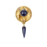 A Victorian lapis lazuli and diamond set brooch, the shaped circular panel applied with scrolled