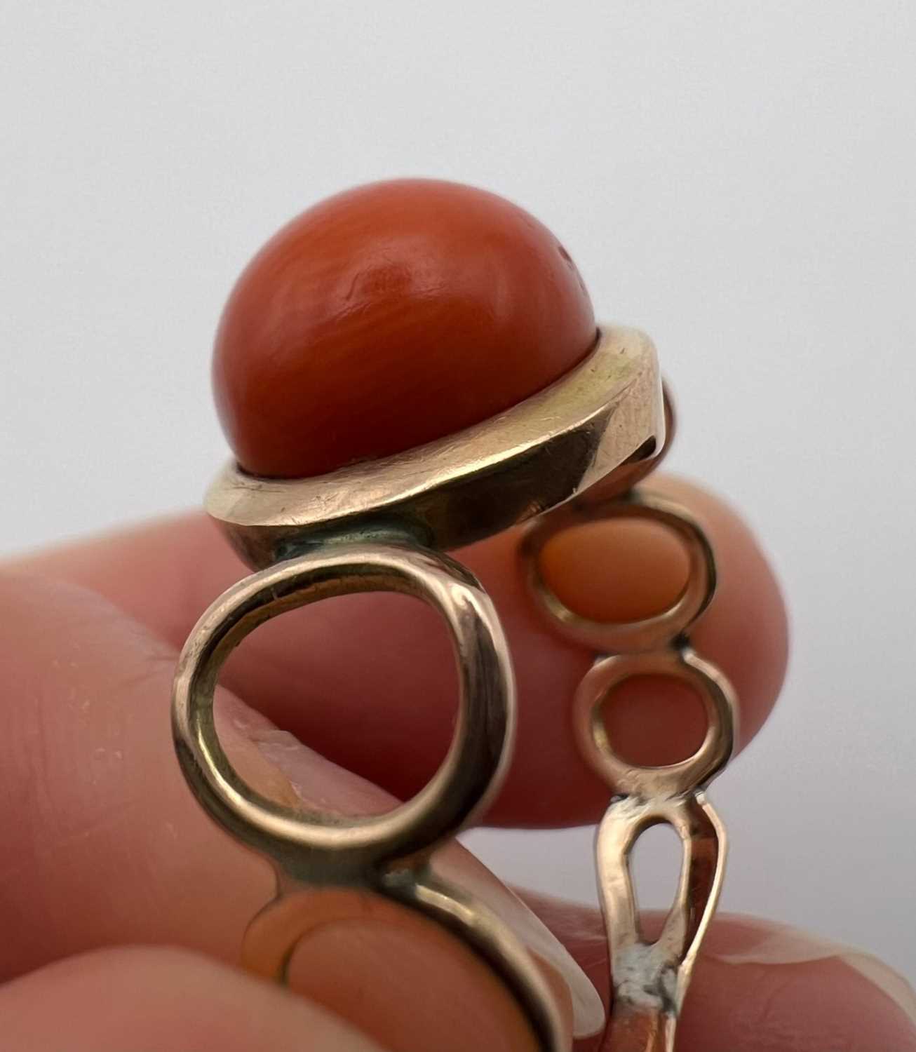 Two coral dress rings, the first a cameo ring, the oval coral corallium rubrum cameo carved to - Image 11 of 14