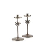 Arts and Crafts A pair of candlesticks pewter 28cm high. Provenance: The collection of Paul