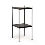 Mid-Century School Two-tier table black enamelled frame with brass finials 81cm high, 35cm wide.