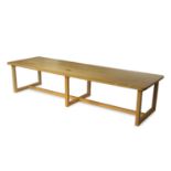 Manner of Terence Conran (1931-2020) Large occasional or coffee table birch 46cm high, 213cm wide.