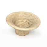 A Sasanian terracotta incantation bowl of conical form with Aramaic writing .13,5cm diameter 6.5cm