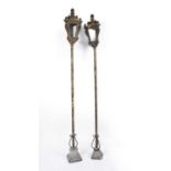 A near pair of 18th century Venetian lanterns with pole supports and carved stone bases, each 30cm
