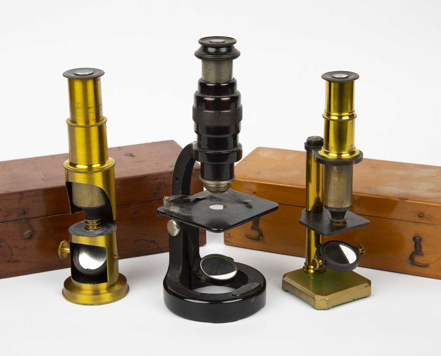 A small 19th century brass drum microscope 15.5cm in height in a fitted mahogany box together with a - Image 2 of 3